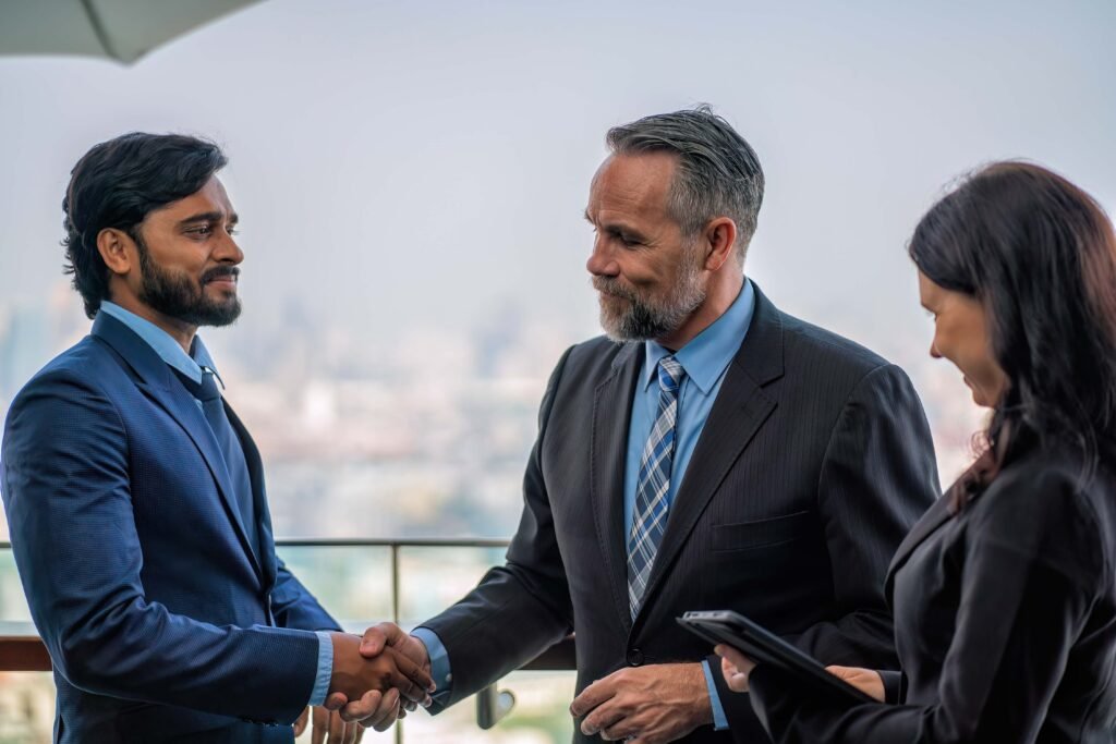 Chief executive officer with secretary meet up with business man at the rooftop balcony discuss on business investment