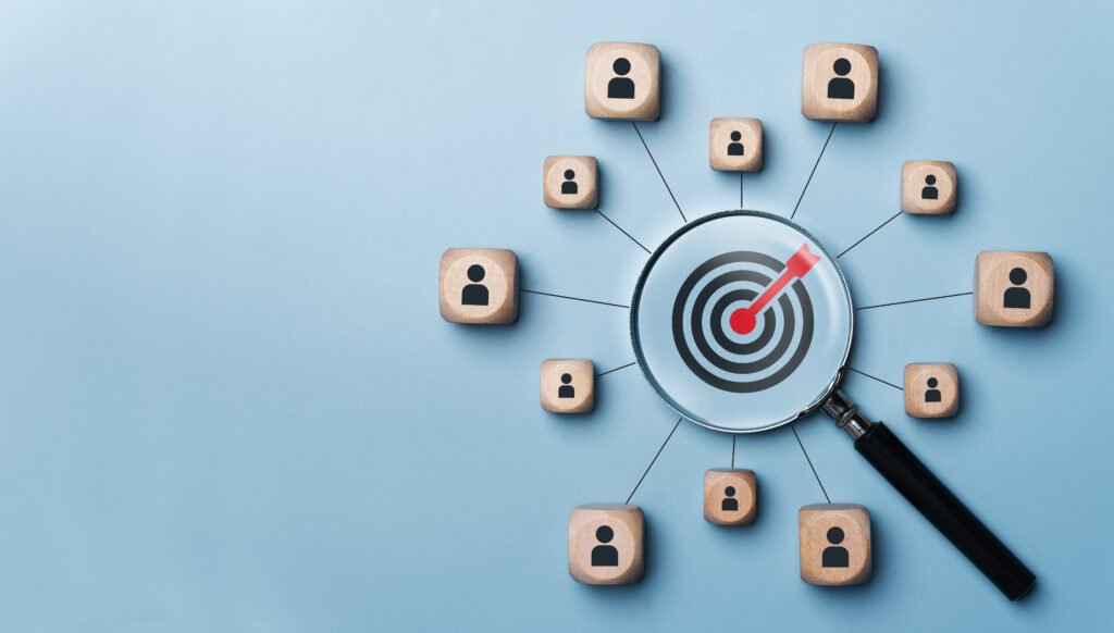 a magnifying glass laser focused in on a specific target client for marketing