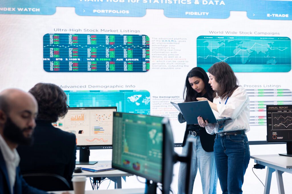 Professional forecast affiliates group work in monitoring room, making crucial decisions together to ensure objectives accomplishment and work on international business expansion.