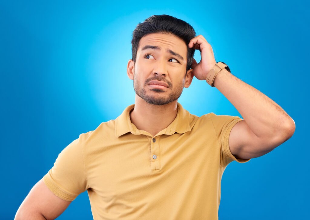 Thinking, head scratch and man brainstorming solution, problem solving plan or strategy development. Confused