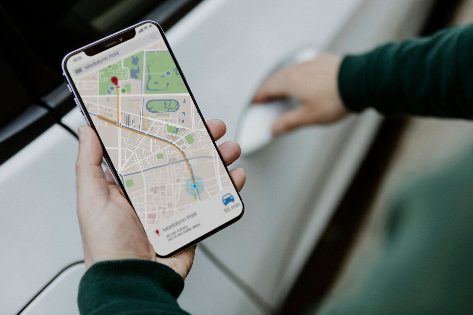 Man looking at a map on his smartphone for a realtor near him