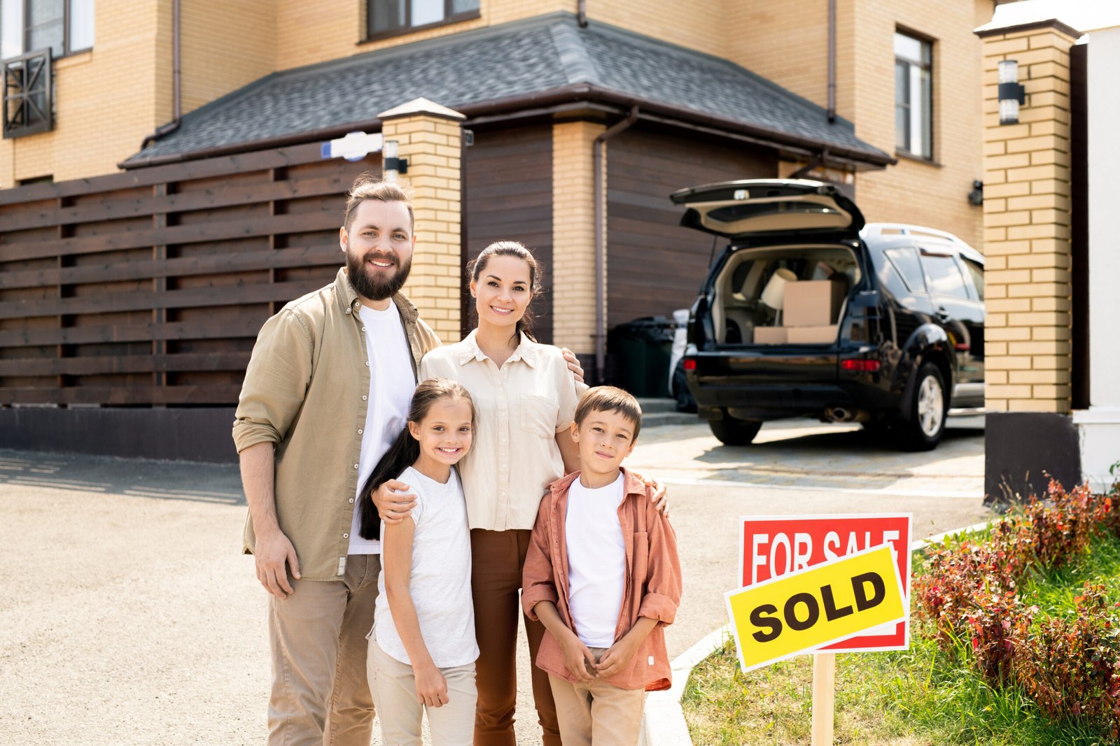 luxury family happy they sold their home with a listing agent