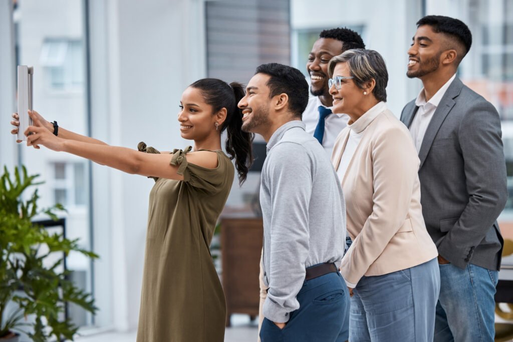 a realtor takes a selfie with her clients who she met from her luxury website