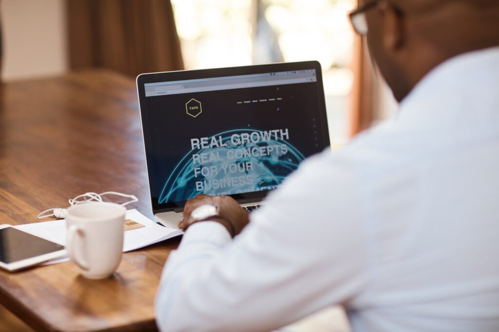 website homepage tips for realtors. A real estate agent looking at his homepage
