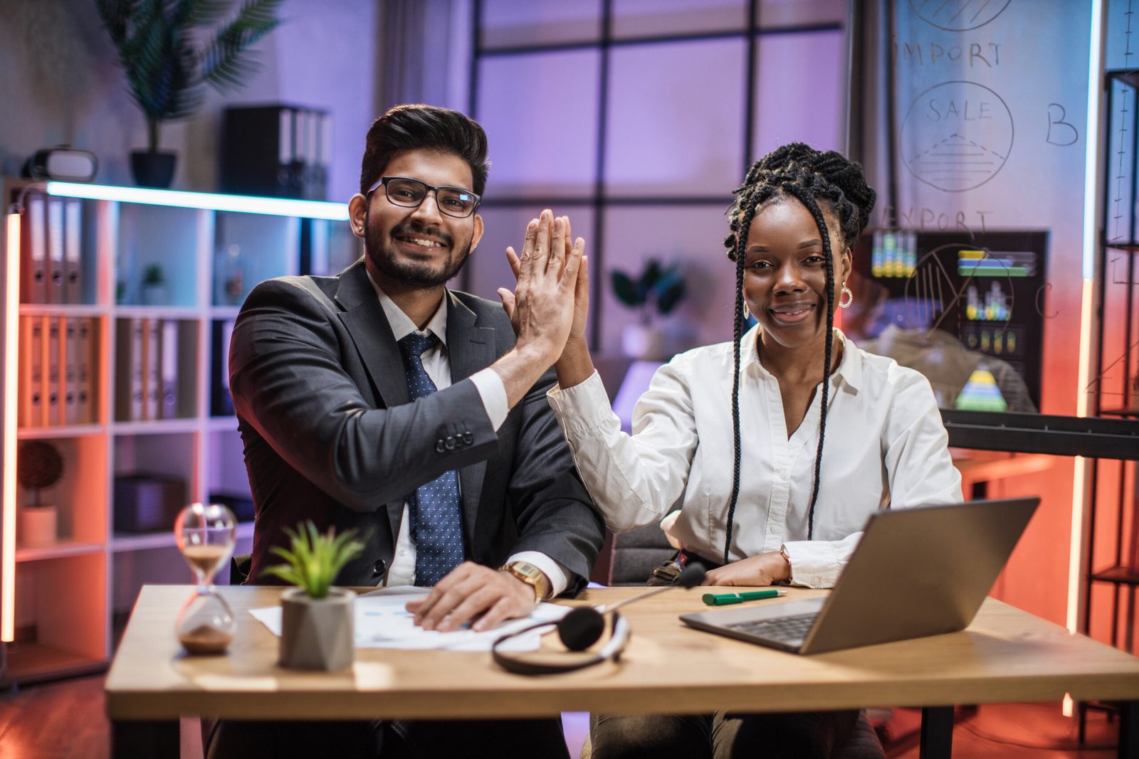 tow realtors happy that they are getting their clients success